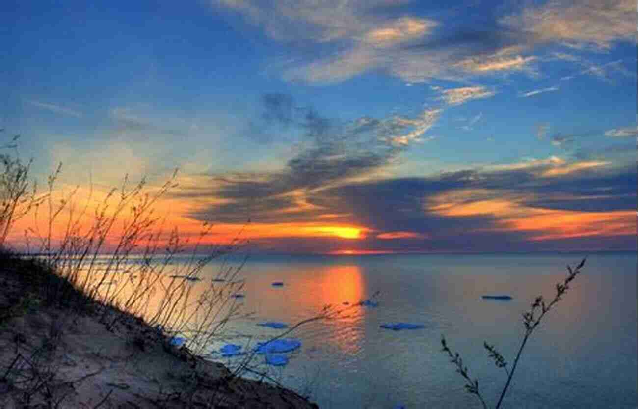 A Breathtaking Sunset Over Lake Michigan Michigan Bucket List Adventure Guide: Explore 100 Offbeat Destinations You Must Visit