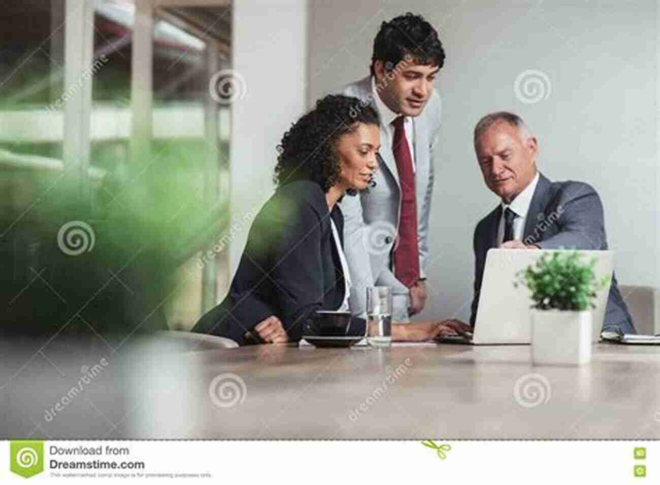 A Group Of District Level Leaders Discussing Strategy In A Boardroom The Superintendent S Rulebook: A Guide To District Level Leadership