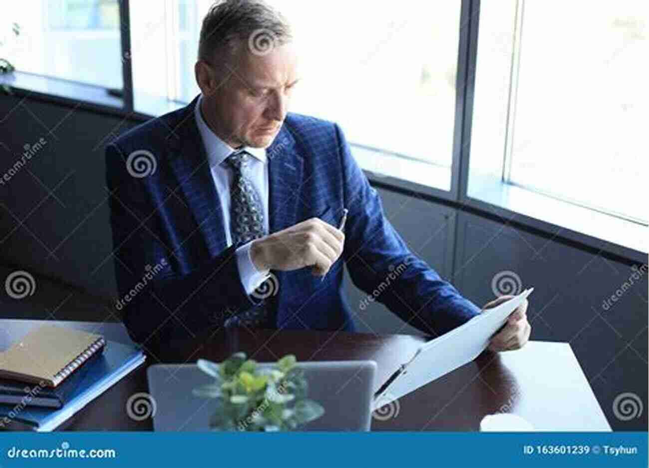 A Man Deep In Thought While Sitting At A Desk Five Great German Short Stories: A Dual Language (Dover Dual Language German)