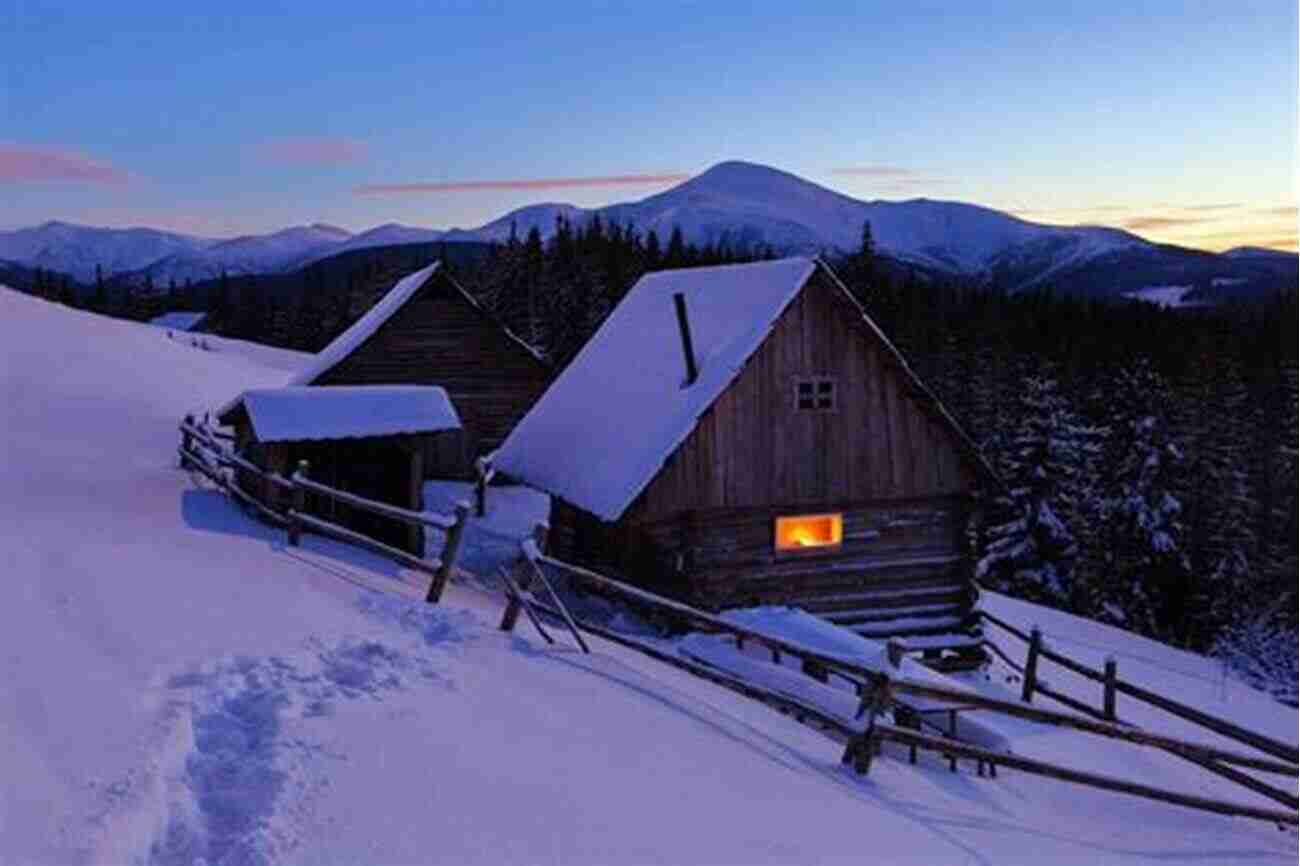 A Traditional Alpine Chalet With Snow Capped Mountains In The Backdrop The Alps Jackie Speicher