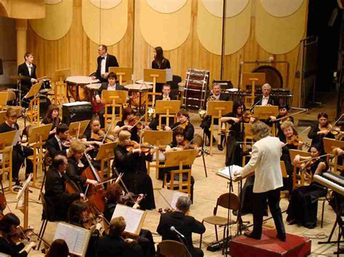 A Young Person Enjoying Classical Music In A Concert Hall A Young Person S Guide To Classical Music