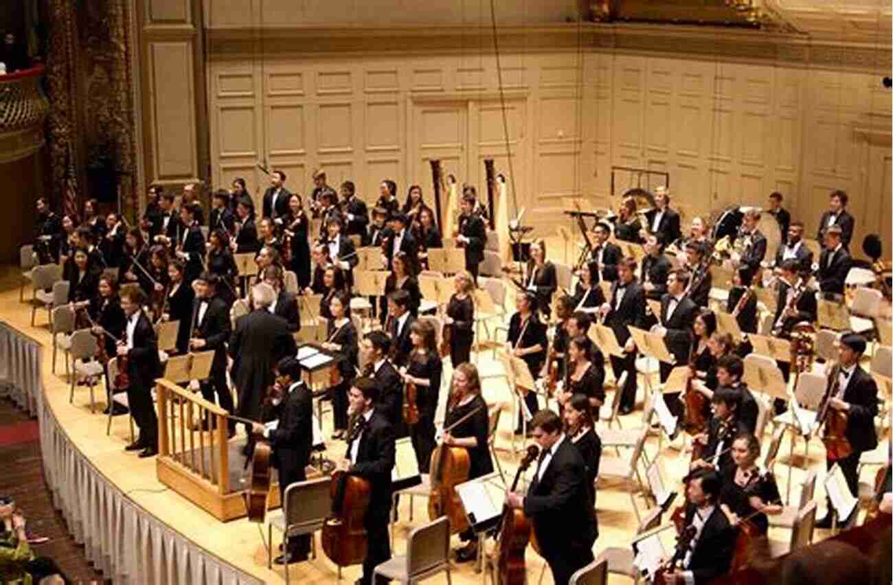 Organoliseh Joseph Cermatori Performing Live, Surrounded By A Full Orchestra, Captivating The Audience With His Mesmerizing Piano Playing PIANIST PRIDE 1: ORGANOLISEH Joseph Cermatori