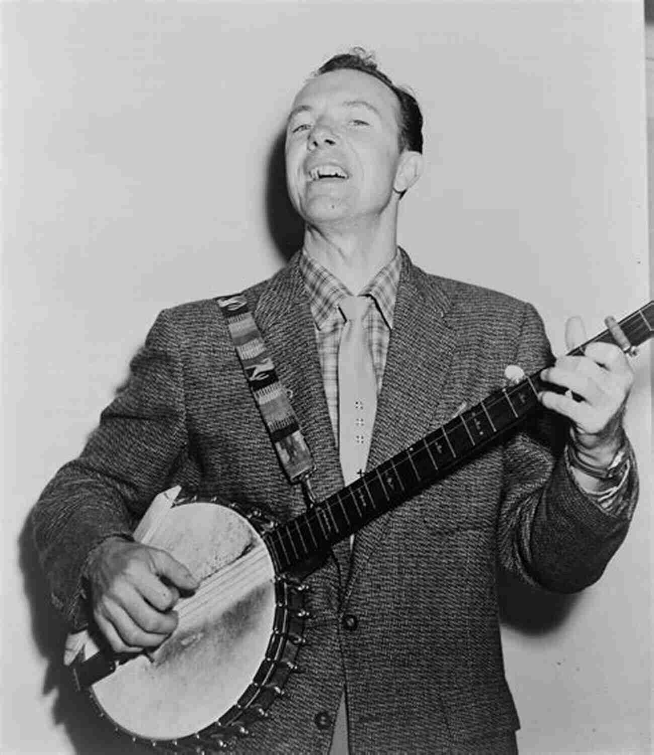 Pete Seeger Playing His Banjo Raised By Musical Mavericks: Recalling Life Lessons From Pete Seeger Lightnin Hopkins Doc Watson Reverend Gary Davis And Others