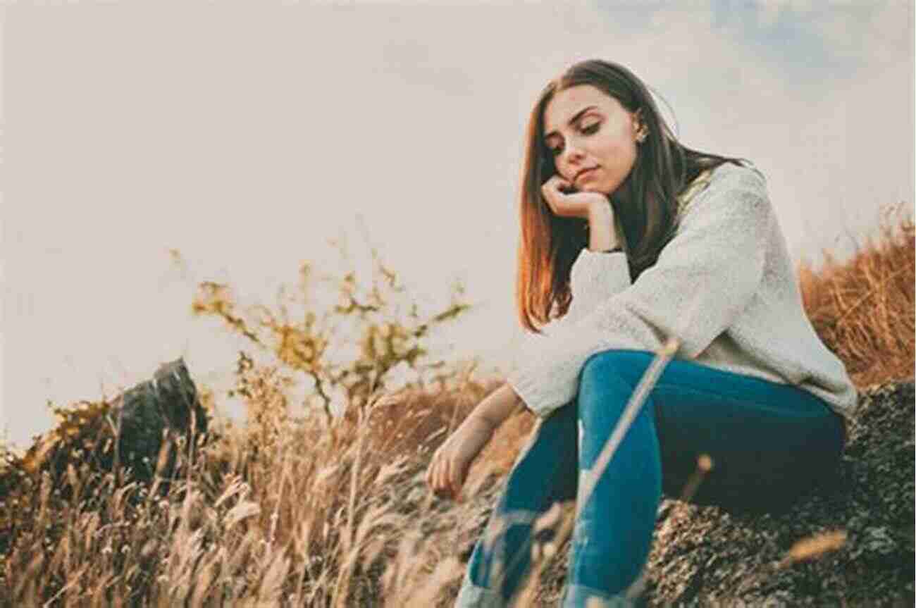 Woman Sitting In A Peaceful Garden, Finding Tranquility After Losing A Loved One Straight Talk About Death For Teenagers: How To Cope With Losing Someone You Love